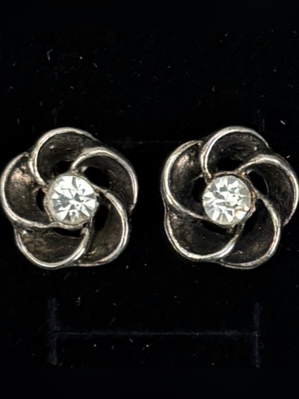 Beautiful, aged Silvertone, weighted center bling flower pierced earrings